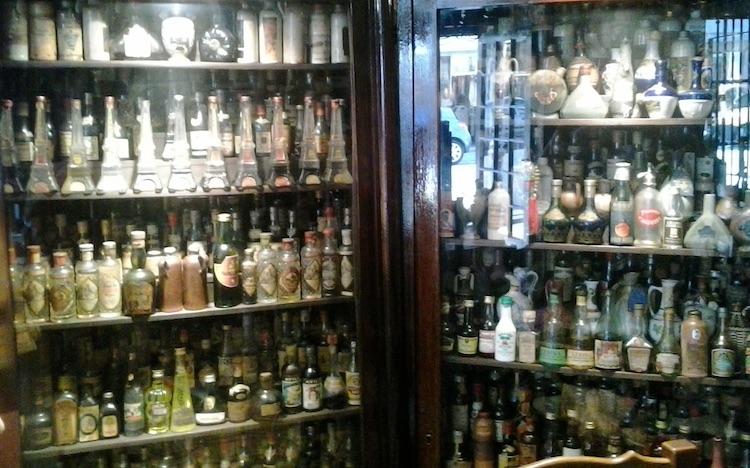 Schnapps bottle collection at La Gargamelle in Nice