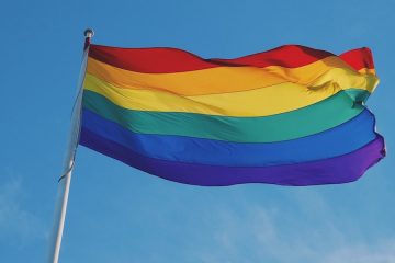 Pride flag by Kirsty Lee on Unsplash