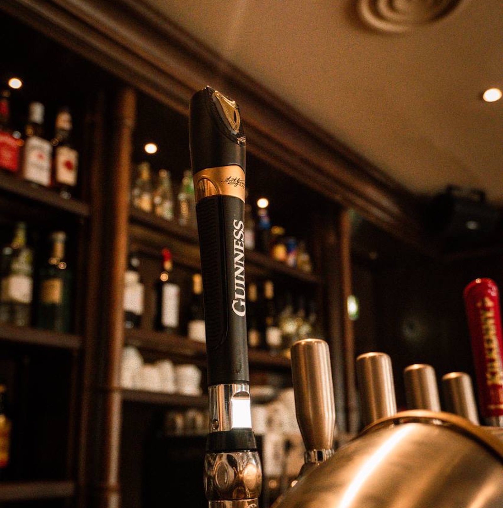 Guinness tap in Ma Nolan's pub in Nice